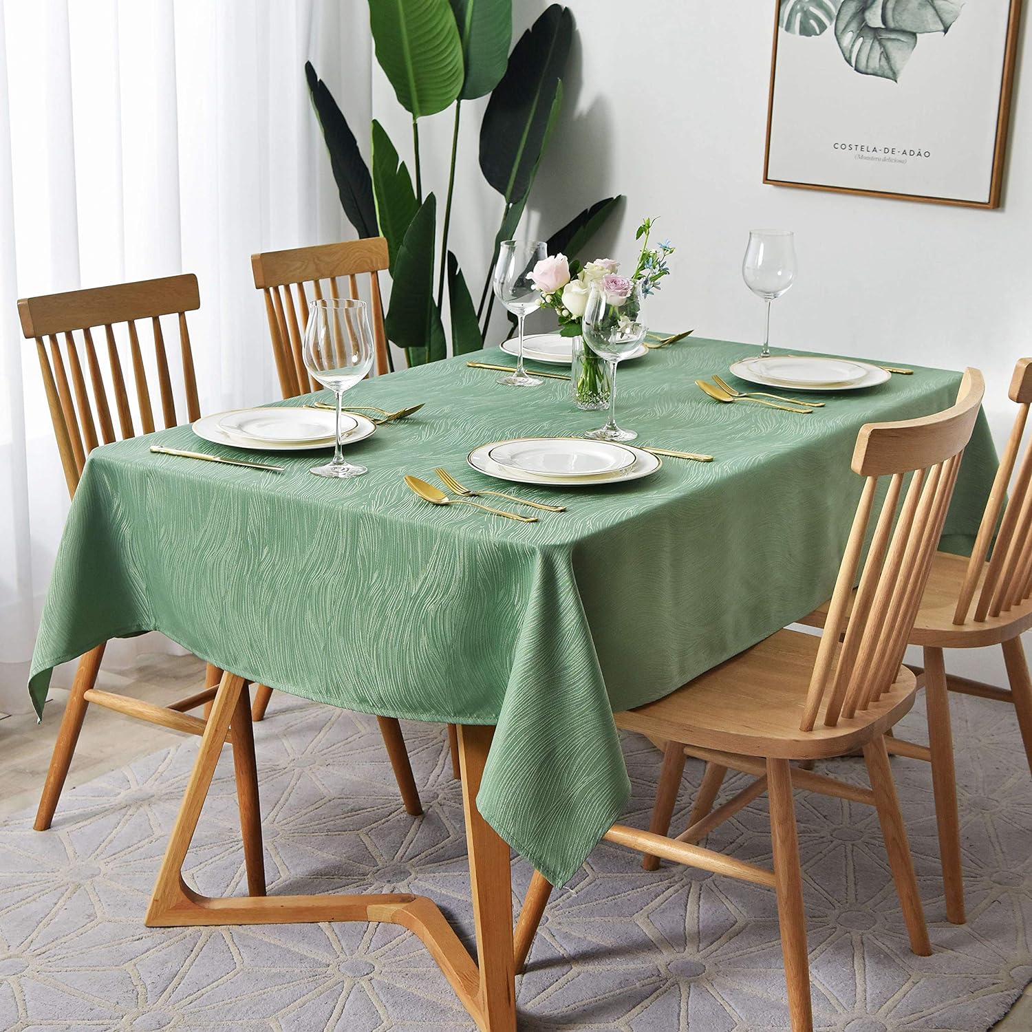 This tablecloth was a surprise to me. It' got a nice, sturdy feel and the little waves in the fabric design are really pretty. Adds a different look to the table than just a plain smooth tablecloth fabric would. It was the perfect size for the table, and it didn't slide around. It was wrinkled in the package, but easily ironed out. The grandkids dropped dressing on the table; it brushed off without any stain left behind. The white is a clear, bright white color, which is what I wanted to brig