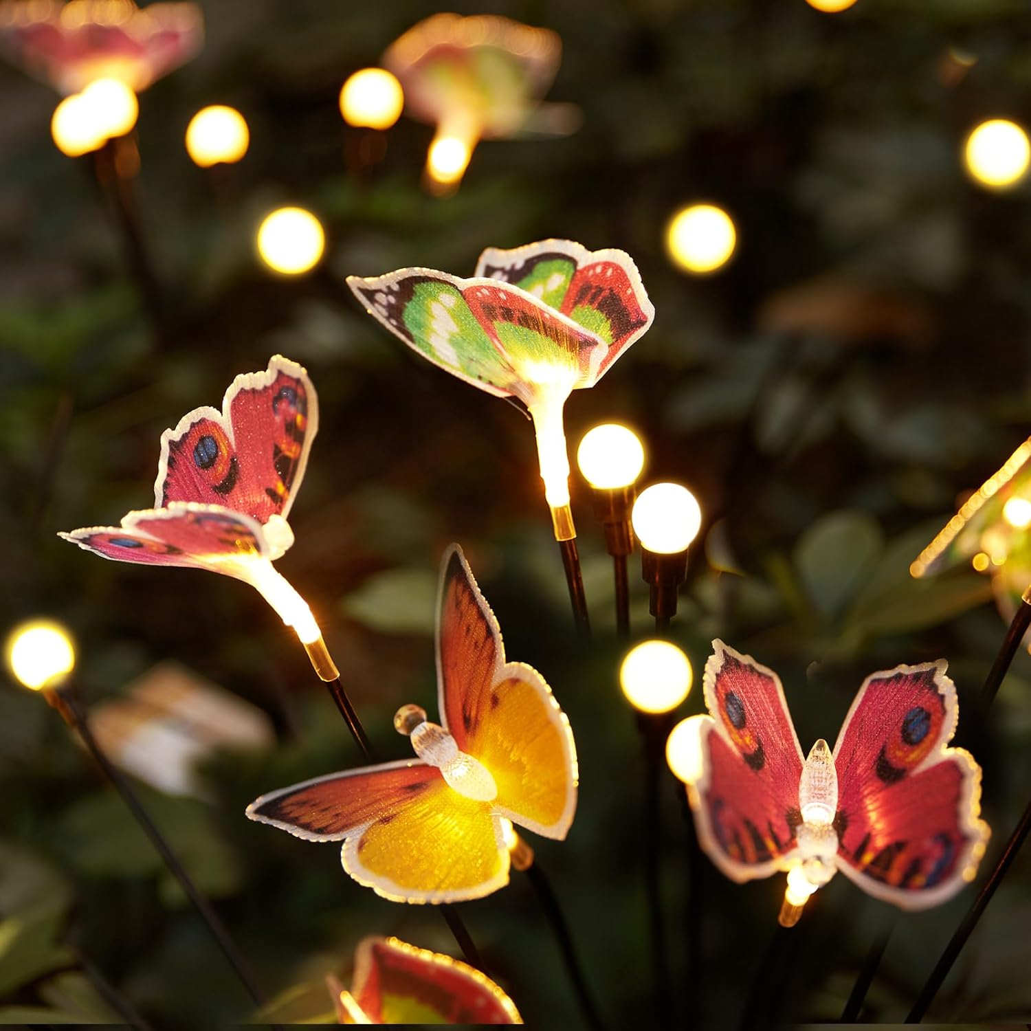 Delxo Solar Garden Lights, Swaying Butterfly Outdoor Light, Wind Dance Solar Firefly Lights Waterproof for Patio, Yard, Pathway Decoration, 12 Solar Butterfly, 32 Warm White LED Beads (4 Pack)